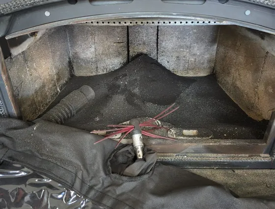 Firebox interior swept clean of ash and creosote